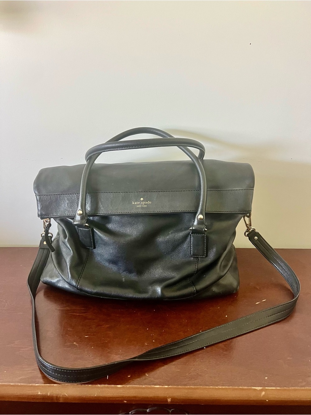 Kate Spade black leather messenger bag